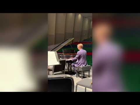 Eli performing in a masterclass