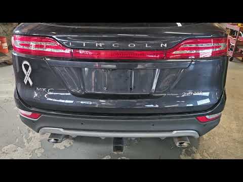 Lincoln Mkc and Ford Edge tailgate won't open. Tailgate module making clicking noise.