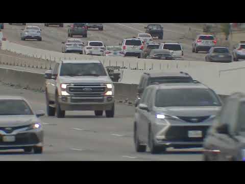 Security guard in uniform when he pointed gun at driver, records show