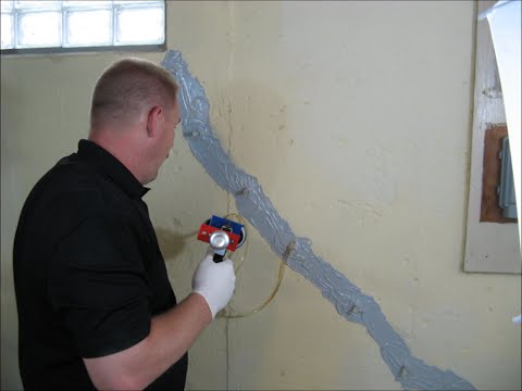 Part of a video titled 30' Epoxy Concrete Foundation Crack Repair Kit-How To Instructions
