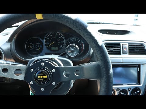 Momo steering wheel and NRG quick release install on the Subaru WRX