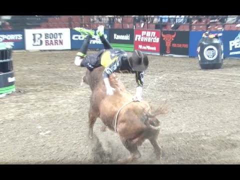 Bullfighter makes incredible jump over charging bull
