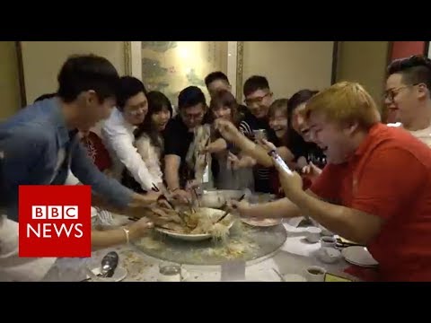 Chinese New Year food: How to get rich tossing fish - BBC News