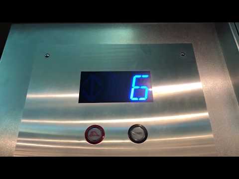 Otis Mod. by ? Mod by Kone Traction Elevators at Mason O'Farrell Garage in San Francisco, CA