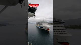 AIDAnova and P&O Iona sail by in Alesund, Norway