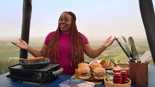  Woman flipping burgers in a giant air balloon
