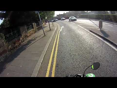 Taxi driver close pass at pinch point Milltown roundabout YR05FZL YR05 FZL