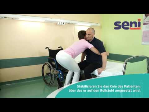 [DE] 03 Seni - Patiententransfer vom Rollstuhl ins Bett mit Kniestabilisierung
