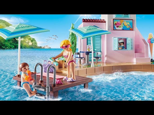 Vídeo relacionado con PLAYMOBIL Junior 71703 Torre Aventura con Heladería, Incluye tobogán y Noria, Juguete sostenible Hecho de plásticos a Base de Plantas, Juguetes para niños a Partir de 1 año
