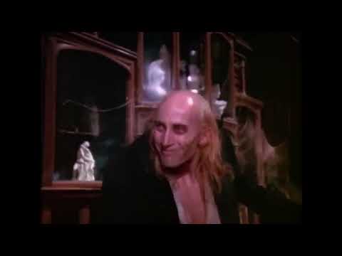 The Rocky Horror Picture Show trailer still: the scarlet lips over black, framing the cult invitation