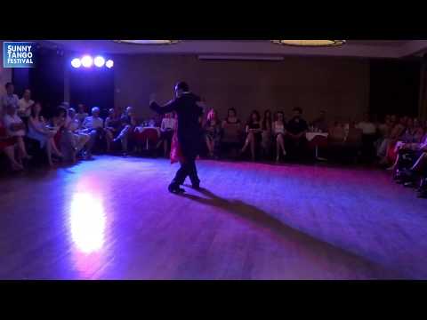  Vassia Thanopoulou  and  Gabriel Marino  are  dancing  to  the  tango  "  Milongueando en el 40  "  by  Forever Tango  at  Sunny Tango Festival  in  2019