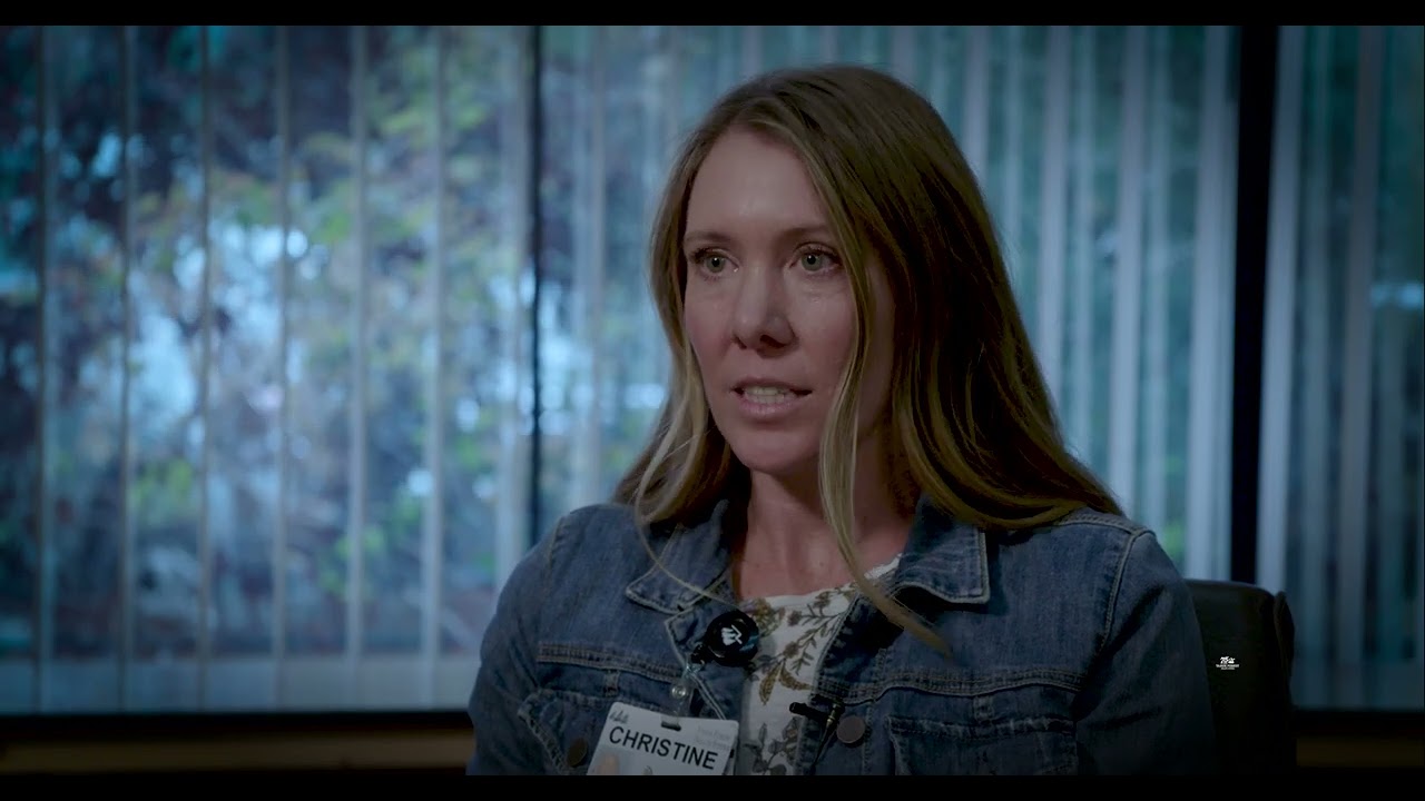 Christine Teittinen, RN, Lead Nurse at Tahoe Forest Health System's Intensive Cardiac Rehab, sitting in front of a window