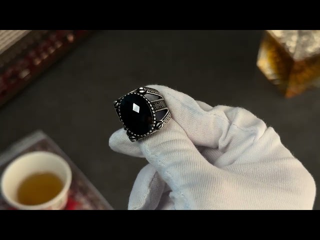 Men's silver ring decorated with black zircon stone