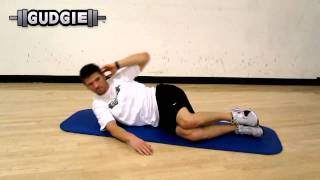 Floor laying on side oblique crunch exercise video thumbnail