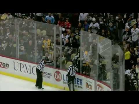 Aaron Asham hits Travis Hamonic and knocks out the glass [HD]