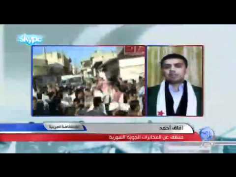 تقرير تلفزيوني لقناة الحوار لحظة اعتقال مدير مكتب العمليات الخاصة في المخابرات الجوية آفاق محمد أحمد من قبل المخابرات الأردنية  أثناء لقائه مع قناة الحوار الفضائية في برنامج الإنتفاضة العربية