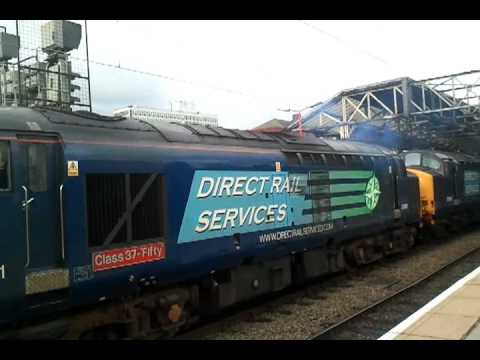 37601 & 37603 erupting out of Crewe with clag