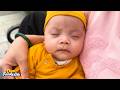Baby Kim Slept Soundly While Her Mother Carried Her For A Walk