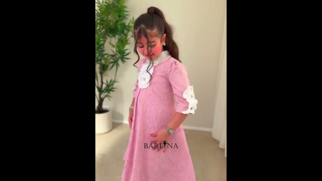 A soft, girly dress adorned with lace details. - 6 years