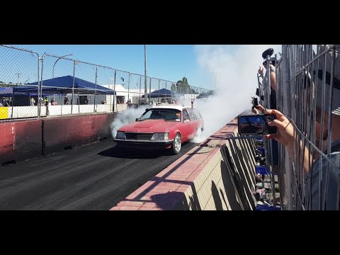Summernats 35: barra powered VH Commodore on skid row