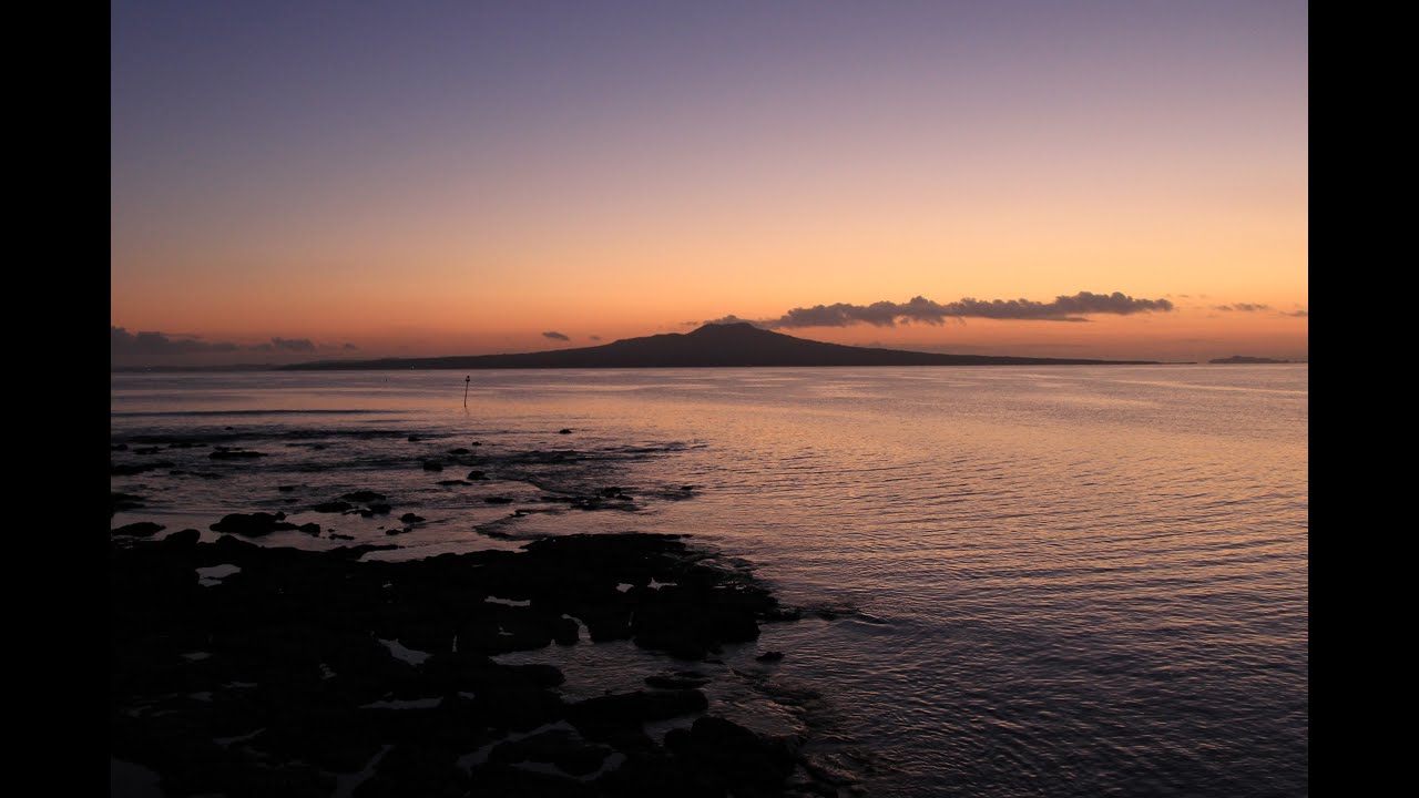 Experience captivating aerial views of Takapuna Beach.