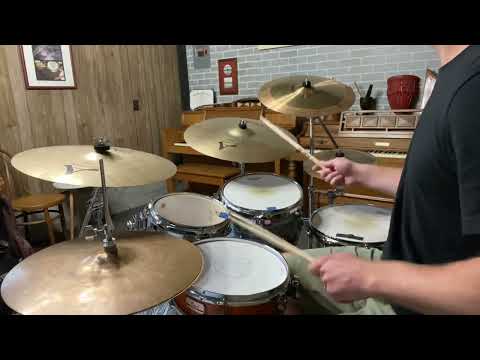Light and Fluffy - fast paradiddle diddle fills in a up beat jazz samba groove.
