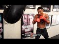 REGIS PROGRAIS SHOWS YOU PROPER BOXING HEAD MOVEMENT WHILE HITTING THE HEAVY BAG