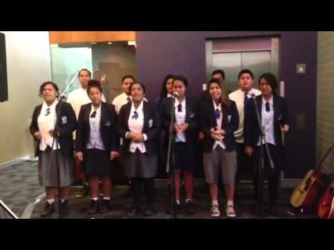 Mabel Park and Woodridge State high school students singing for Logan City volunteers