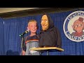 jaxson murphy performs at the 2023 international ventriloquist convention