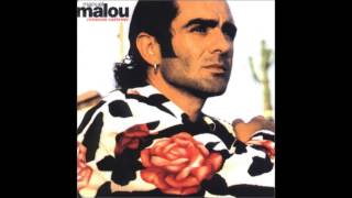 Manuel Malou-Tus labios