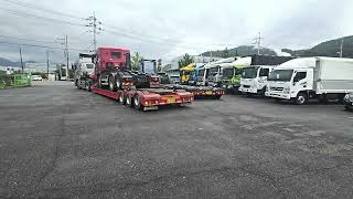 Tractor low bed loading