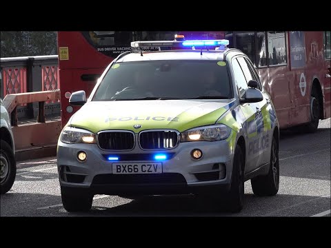 Armed Response: Metropolitan Police cars responding with horn, siren and lights