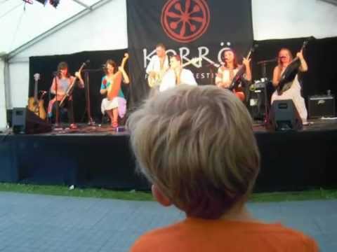 Korrö Folk Music Festival Sweden 2012 the Cherry Band from Ukraine.  Youngsters enjoy Mt Song