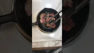 Seasoning Cast Iron With Bacon #shorts