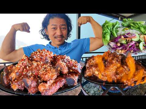 Sizzling Pork Ribs, Chickpeas, cucumber salad and Rice