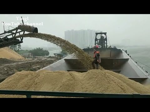 Large barge loading and unloading 5000 tons of sand !