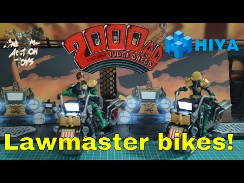 Judge Dredd & Judge Anderson on Lawmaster MK2s. Very cool 1:18 scale action figure sets from Hiya.