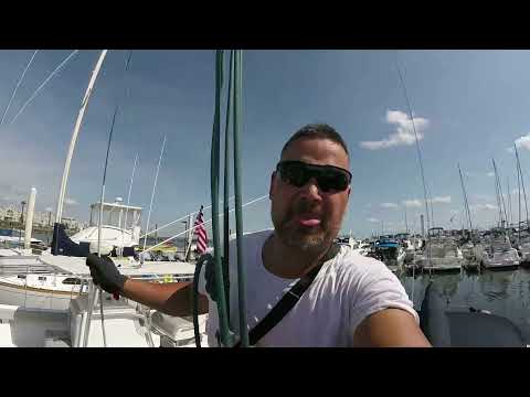 Climbing the mast of a Catalina 30 Sailboat with a block and tackle