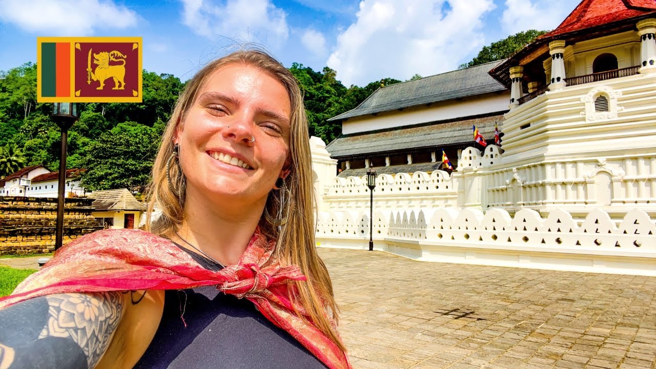Join a tourist on a captivating visit to Temple of the Sacred Tooth Relic.