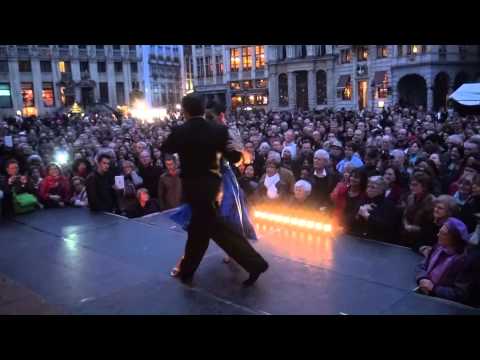  Adrian Veredice  and  Alejandra Hobert  are  dancing  to  a  tango  at  Brussels Tango Festival  in  2014