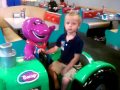 Aidyn Rides With Barney At Chuck E Cheeses
