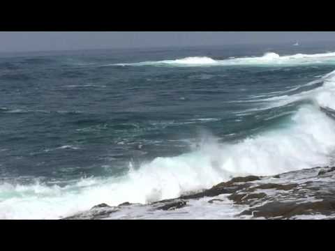 Surfer Leaps Into an Angry Ocean