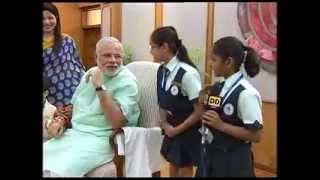 Women, children tie rakhi on Narendra Modi's wrist