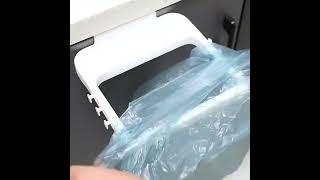 Závesné držadlo na odpadkové vrecúško 2v1