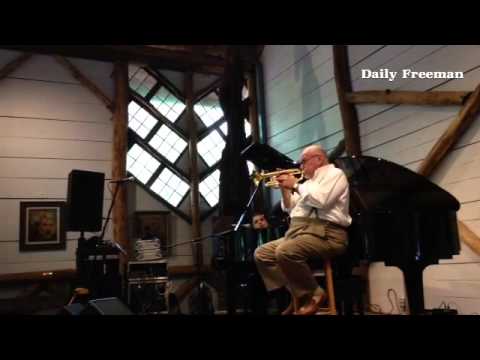Trumpet and cornet player Warren Vache plays a duet with John DiMartino on piano at Maverick Concert