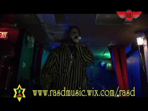 queen video performance by Ras D