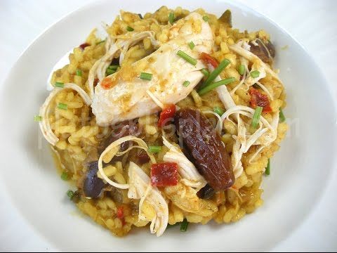 Risotto al curry con hebras de pollo