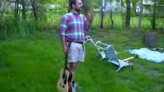 Rob Bronco sings in Laura's backyard to a bunch of Icelandic