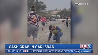 Arrests Made After Drivers Scoop Up Cash Scattered On Carlsbad Freeway