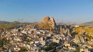 Uchisar Nevsehir Turkey Aerial view blending ancient Uchisar Castle with modern Uchisar town a